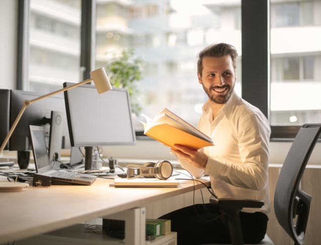happy employee at desk